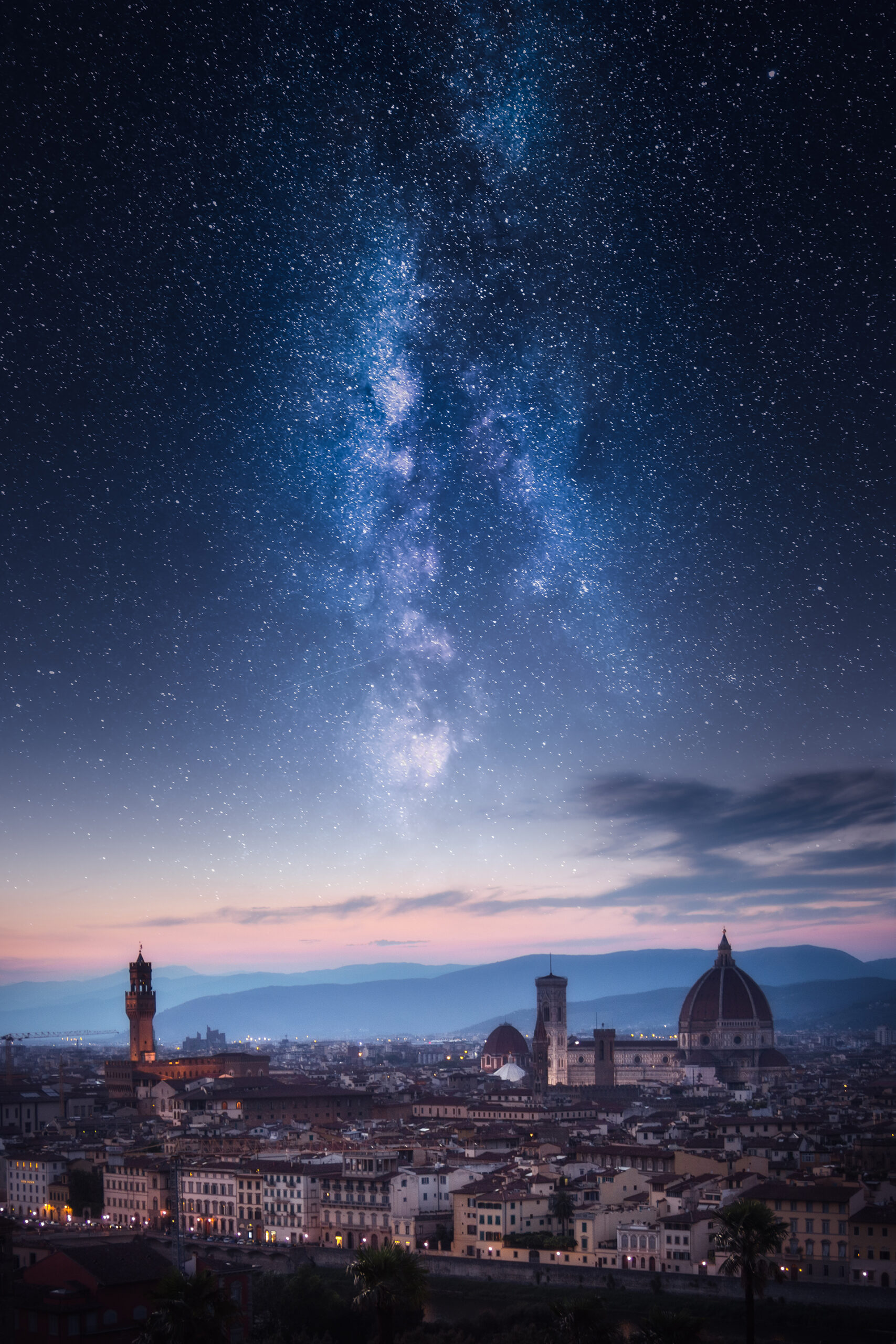 Florence city skyline under milky way